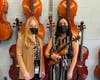 Amanda Quintanilla (right) and her orchestra teacher, Ms. Nicole Verderosa (left).