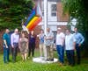 Mayor Jimmy Davis, the City Council and Chairwoman Amy DeGise raise the Pride Flag in Bayonne.