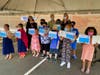 Rossi congratulates Savin Rock Community School fourth graders on their promotion during a ceremony in the school parking lot Tuesday. With Rossi are Principal Taryn Driend, right, and fourth grade teacher Kerry McQueeney.