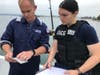 A Coast Guard Sector San Diego inspection team conducts an enhanced underway inspection on a small passenger vessel in the San Diego Bay, July 7, 2021.