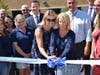 Rocky Point School District administrators, PTA members, Board of Education trustees and community members joined Rocky Point Middle School Principal Dawn Meyers and PTA member Kristine Susmin cutting the ribbon.