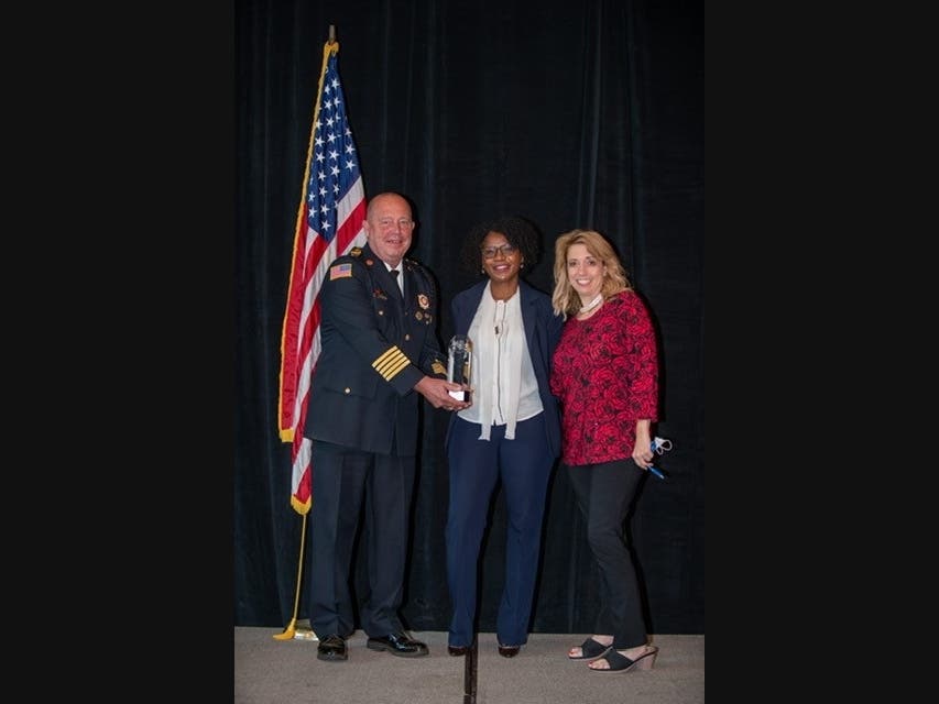 Pictured left to right: Illinois Fire Safety Alliance President Chief Jim Kreher, Sen. Adriane Johnson and Government Affairs Director Margaret Vaughn. 