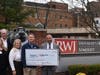 Jessica Ust, Director of Development; Sparky Lyle, Donna Castronovo, Vice President, Foundation and Development; Sparkee, Patrick McVerry, Patrick Delaney, Chief Operating Officer at RWJUH Somerset.