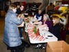 Parents dropping off gifts to Santa’s helpers at the firehouse.