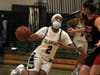 Keyaisia Brewster (No. 2) battles in a win against Patchogue-Medford earlier this season. 