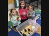 Scarlett Valentino, Megan MacDougall, Joceyln Rosenthal are taking a turn to gently hold the chicks.