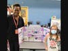 MacDella Cooper and Samantha Kerner pose for a picture after Samantha explained her Capstone project to Cooper.