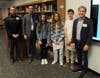 Board of Education President David Brezee, Superintendent of Schools Dr. Matthew Mingle, Grade 8 students Julia Cagno, Lilian Finkelstein, James Andersen, and Congressman Tom Malinowski.
