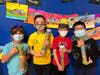 Jake Greenberg, Lucas Araujo, Thomas Chu, and Holmes Yang pose with their rain sticks.