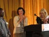 George Adzanu is applauded by Samantha Pozner, president of Overlook's medical staff, and his manager, Charlene Ruggiero