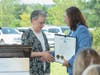 Assemblywoman Mila Jasey, Deputy Speaker of the NJ Assembly, presents a proclamation to Atlantic Health's Trish O'Keefe