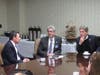Atlantic Health System President & CEO Brian Gragnolati (L), and Alan Lieber (center), discuss health care with Congressman Malinowski (R)