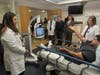 Members of Atlantic Neuroscience's stroke team demonstrate the Telestroke device for Congressman Malinowski