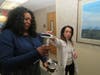 Team members from Overlook’s radiation oncology department discuss how the Cyberknife works to Congressman Malinowski using a miniature of the device