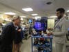 Congressman Malinowski is shown some of the items produced by Overlook's 3-D printer.