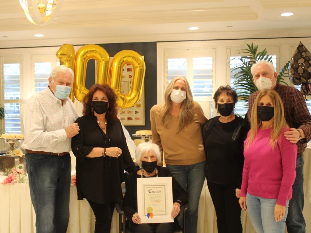 Gertrude Burstein, a resident of The Bristal at Jericho, celebrates her 100th birthday with her children, grandchildren and other family members.