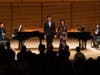 Michelle Chen Kuo and Christopher Kuo Performing on Stage