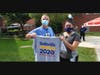   From Clara Maass Medical Center Joseph Wojtecki, Assistant Director of Patient Experience and Sarah Bonilla, MPH, Director of the Center of Excellence for Latino Health display a ‘Belleville Census 2020’ t-shirt at the ‘Community Countdown’ event.