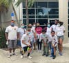 Students involved with the Safe Children Coalition Achievers program helped to distribute turkeys during the drive-thru event in 2020
