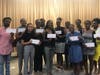 Recent high school graduates/Achievers program participants who received college scholarships during the Safe Children Coalition celebration