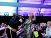 WBTT artist Leon S. Pitts II serenades a guest at the ‘Groovin’ on the Soul Train’ fall gala