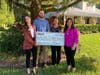 Isabelle Ball (left) of All Faiths Food Bank with Mosaic Company team members Carson Ciavardone, Joann Garza and Heather Nedley for the check presentation in support of the Backpack program in Hardee County