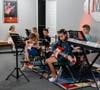 Younger campers participate in the Kidz Rock program at Music Compound MAN