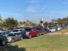 Cars lined up early for the turkey distribution at Ed Smith Stadium last year