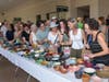 Guests at Bowls of Hope look for the perfect bowl among the 1,000+ donated by amateur and professional craftspeople