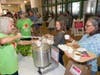 All Faiths Food Bank volunteers provided much-needed assistance during the recent All Faiths Food Bank Bowls of Hope event