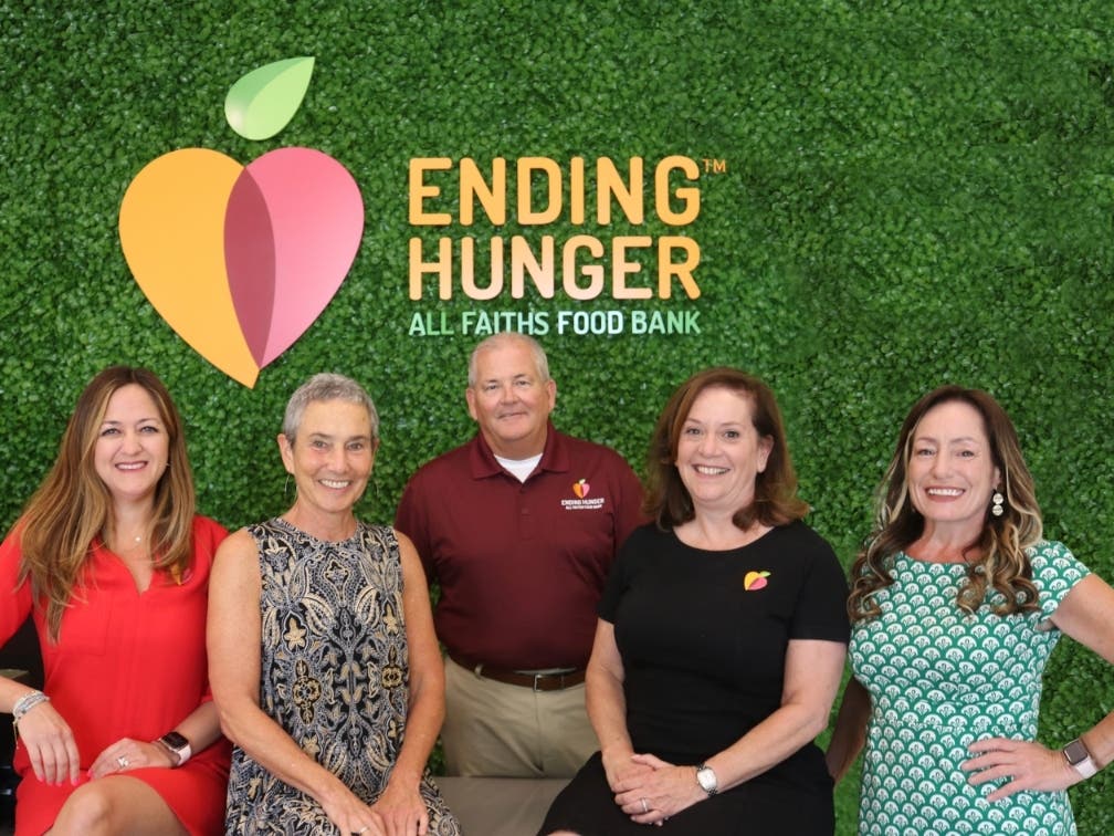 All Faiths Food Bank’s senior leadership team is (from l-r) MJ Horen, Nelle S. Miller, Bill Haley, Denise Cotler, and DD Goerke