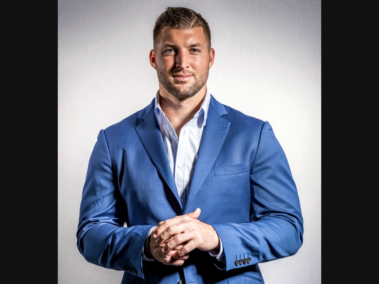 https://patch.com/img/cdn20/users/22950956/20250403/081318/styles/patch_image/public/tim-tebow-blue-suit___03081146450.jpg