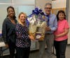 The legal team at Universal North America (from l-r) Susan Burrell, Stella Kilbourne, Andrew Forstenzer and Jean Gayre contributed a spa/relaxation basket for the Foster Appreciation basket drive