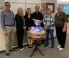Universal North America’s Systems Team K (from l-r) Victor Mandes, Kim Handley, Deniss Morales, Jose Malvas, Milan Balogh, Cynthia Deviney and Chris Glavin won the intra-office competition for the Disney Animal Kingdom Villas Getaway basket