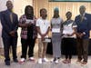 Greater Newtown Redevelopment MLK Scholarship Committee members Torrey Grimes, left, and Jetson Grimes, far right, with MLK Scholarship recipients Jamaal Wynn, Turi Bell, Laudenie Andre and Valeria Howard