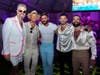 Outgoing PPSRQ President Jason Champion (left) with Luke Barnett, headliner John Duff, and backup dancers Omar Hernandez and Jesse Rey, at Grand Carnival: Palm Royale