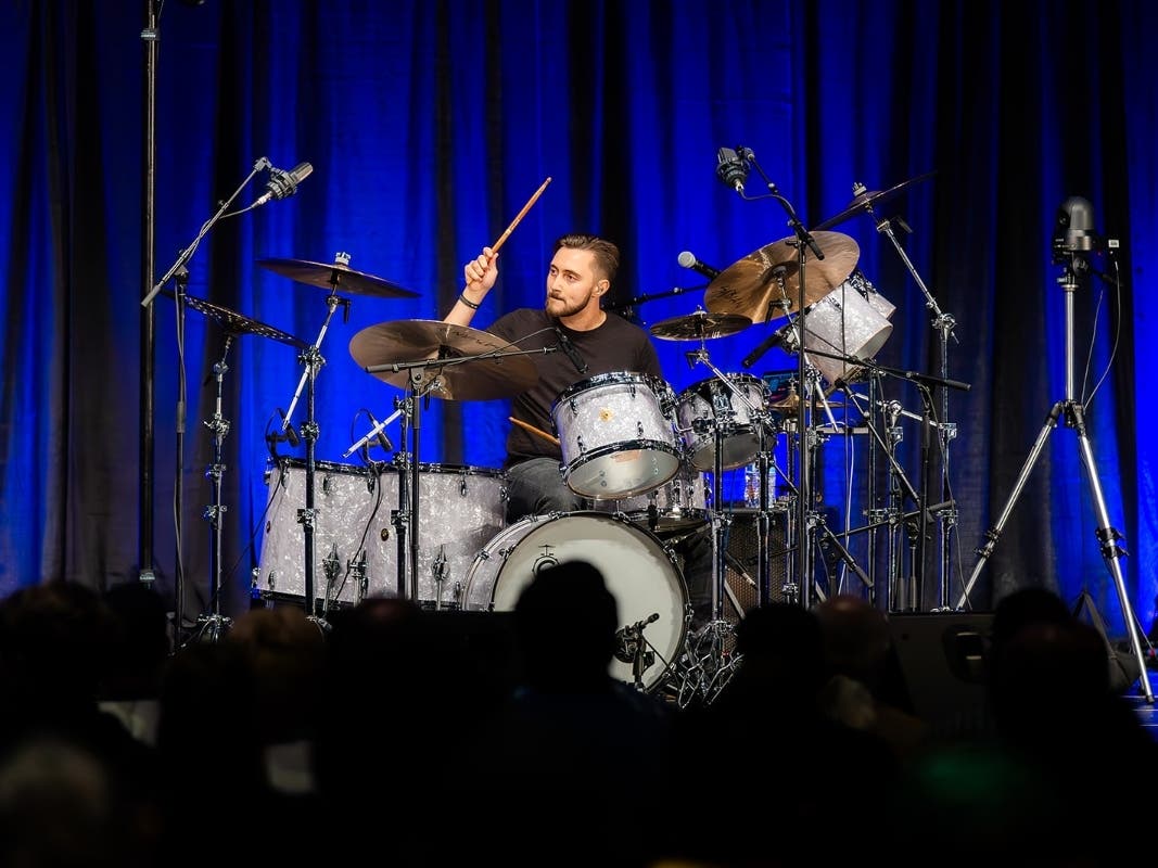 Pro drummer Nic Collins – son of world-famous drummer/vocalist Phil Collins – will be featured during Music Compound’s drum clinic on July 19