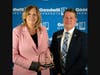 Stephanie DiTroia – who accepted the Community Partner of the Year award on behalf of the Florida Department of Corrections – with Goodwill Industries-Manasota, Inc. president and CEO Donn Githens