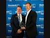 Goodwill Industries-Manasota, Inc. president and CEO Donn Githens (left) with Community Leader of the Year award-winner Mark Vengroff