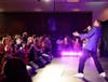 WBTT artist Michael Mendez sings to a packed dance floor during the recent April Fête 