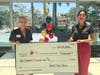 All Faiths Food Bank’s president and CEO Nelle S. Miller (left) and Amanda Eyer, director of internal communications & community relations, Boar’s Head Brand