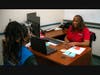 Goodwill Manasota GoodPartner Coach Shirley Walker (right) works with a team member