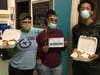 Pictured left to right are Gateway 180 staff Michelle Shannon and Travonica Wright, and St. Louis Food Rescue Student Director Donovan Denham.