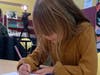 During the kick-off of U.S. Cellular’s Black History Month Art Contest being held in conjunction with Boys & Girls Clubs of Springfield, member Sophie Herzog begins work on her portrait. 