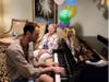 Wrabel surprised Gloria for her birthday and performed for a small group of residents during her party.