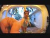 Security footage shows this woman putting Ollie in her black Hyundai Elantra then ringing the neighbor's doorbell. 