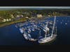 The marina, located at East Ferry Wharf on Jamestown’s waterfront, includes 4,500 linear feet of dockage and 150 moorings. 