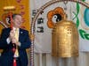 Former U.S. Ambassador-at-Large for International Religious Freedom Sam Brownback, rings the Bell of World Peace and Love in Washington, D.C. on June 28, 2022.
