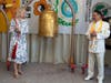 Dr. Katrina Lantos Swett, president of the Lantos Foundation for Human Rights and Justice, left, rings the Bell of World Peace and Love. 
