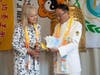 Dr. Hong, Tao-Tze, president of FOWPAL, right, introduces to Dr. Katrina Lantos Swett, president of the Lantos Foundation for Human Rights and Justice, a book titled Conscience: The Wellspring of Wisdom, a collection of the excerpts of Dr. Hong’s speeches